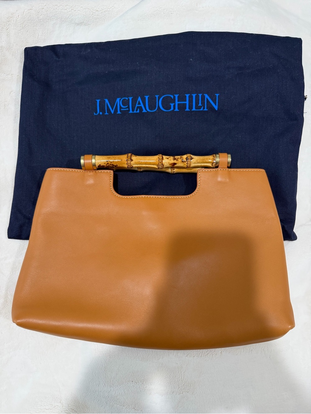 J. McLaughlin Tan Leather bag with Bamboo Top handle & magnet closure.